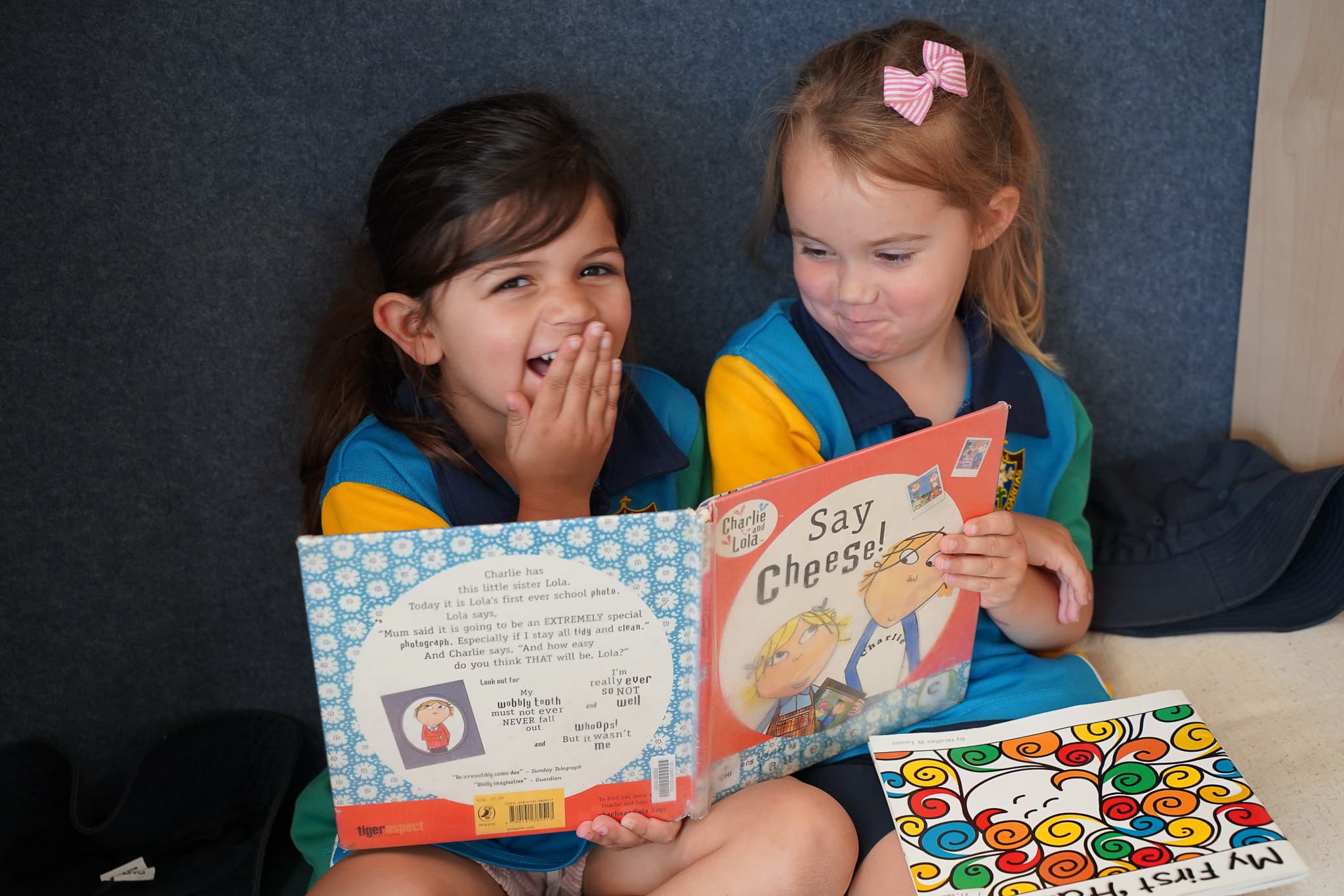 Preschool students enjoying book time