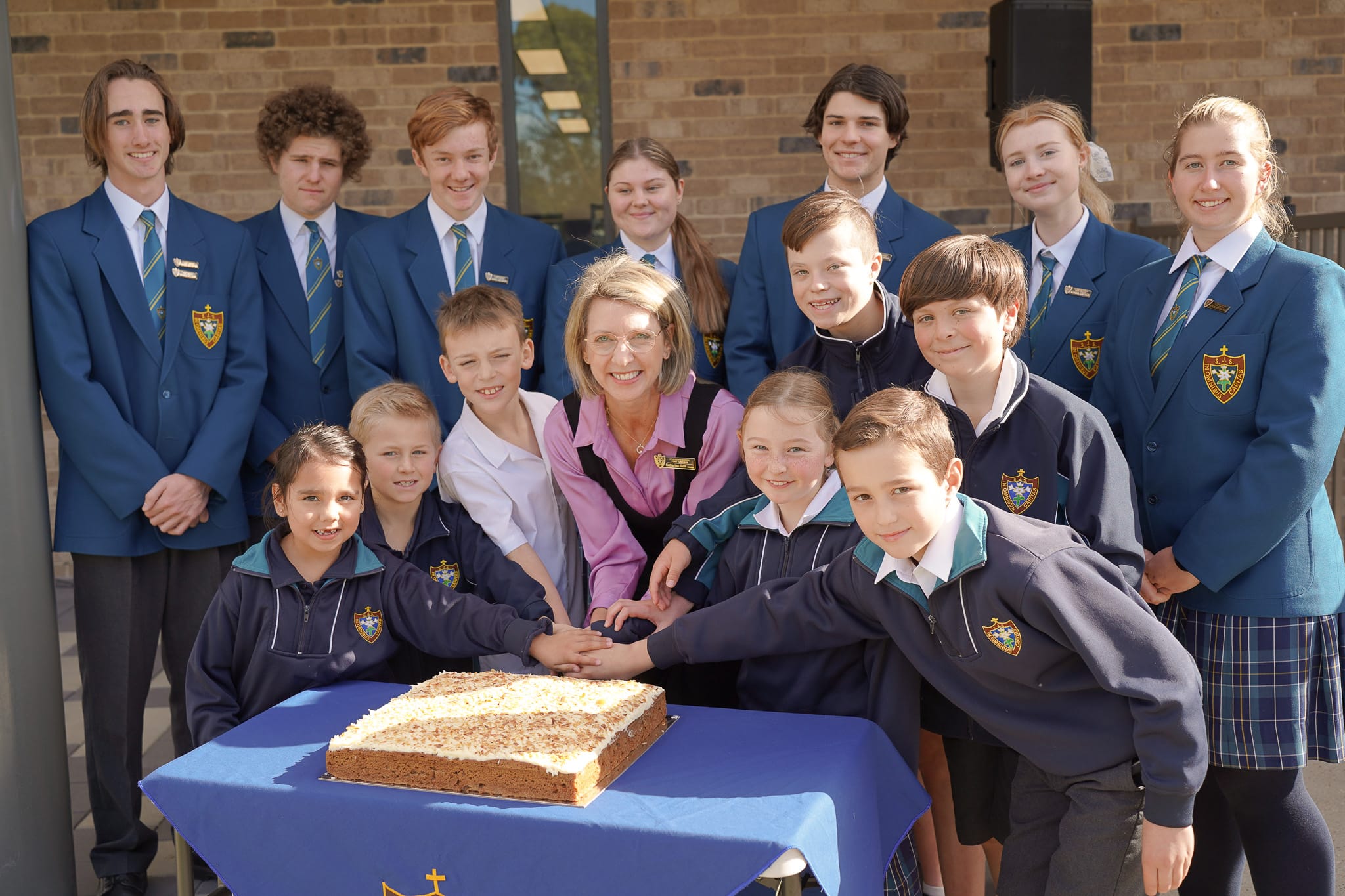 Principal and students at the official Caritas Centre opening